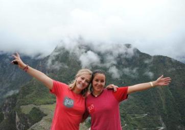 Urban Leadership Scholars smiling and posing in front of a mountain